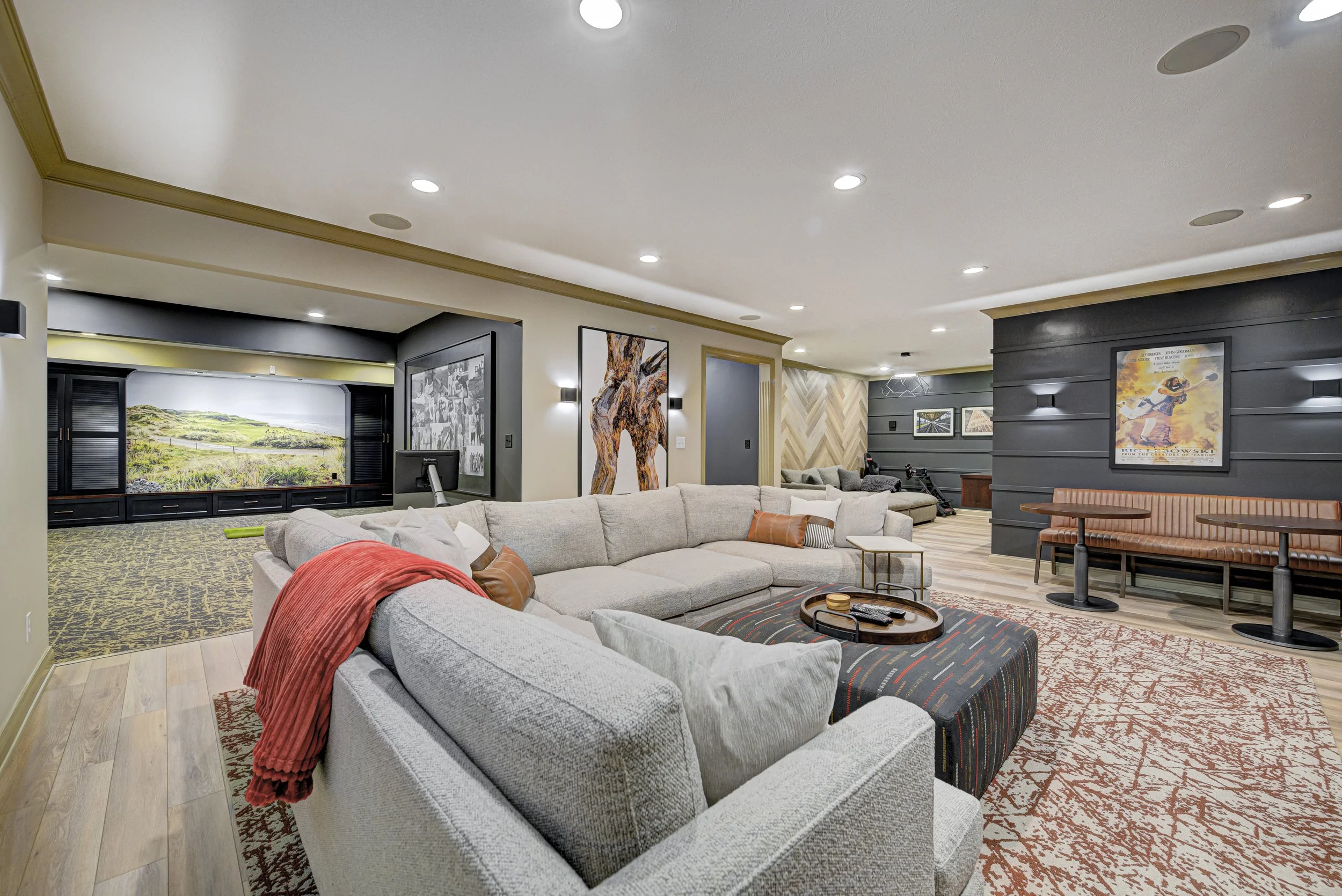 Carmel basement remodel with a custom bar, lounge seating and layered lighting